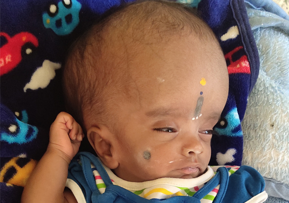 This baby was left in the garbage and we are looking him.